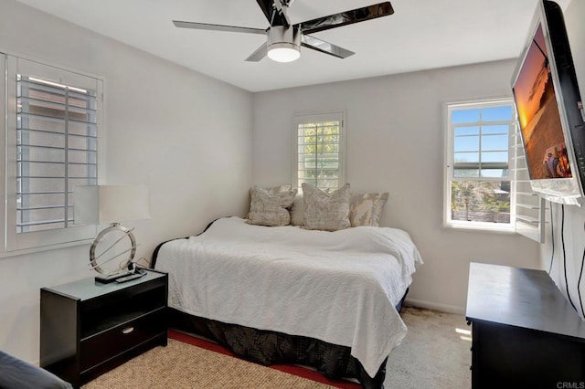 1685 Brezar St, Chula Vista, CA 91913 - bedroom featuring multiple windows, light carpet, and ceiling fan