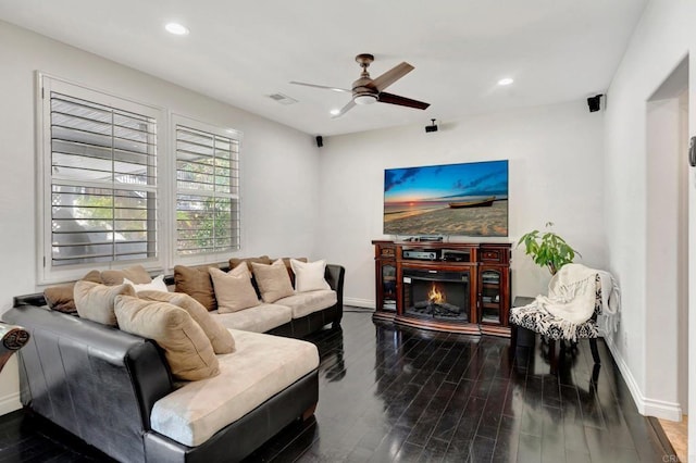 1685 Brezar St, Chula Vista, CA 91913 - living area featuring a ceiling fan, dark wood-style floors, recessed lighting, and a glass covered fireplace