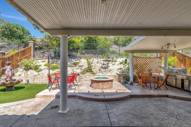1685 Brezar St, Chula Vista, CA 91913 - fenced backyard with an outdoor fire pit, a patio, grilling area, and outdoor dining space