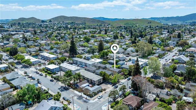 aerial view with a mountain view and a residential view