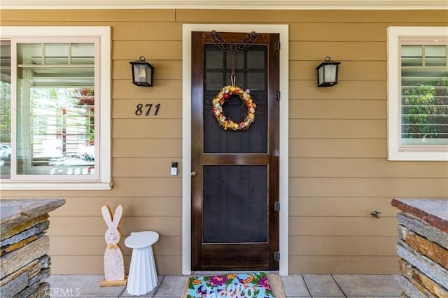 entrance to property with covered porch