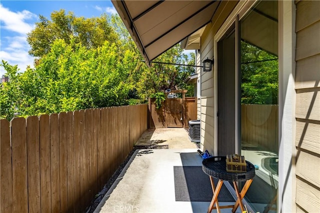view of patio / terrace featuring fence