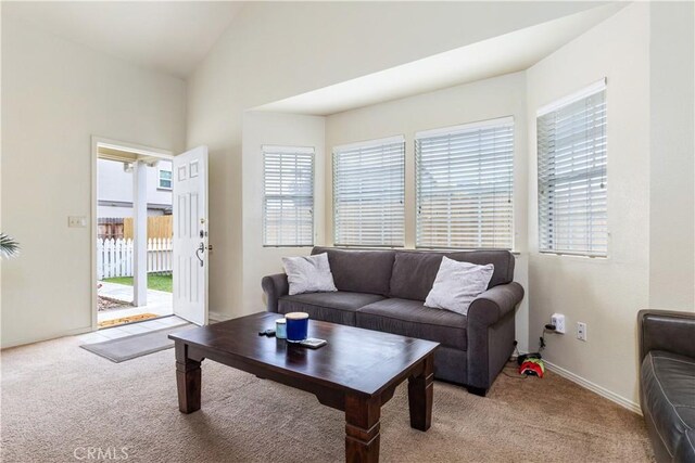 41 Thomas Ct, Templeton, CA 93465 - living room with light carpet, lofted ceiling, and baseboards