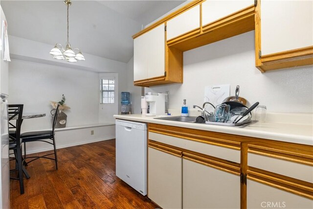 41 Thomas Ct, Templeton, CA 93465 - kitchen with white dishwasher, dark wood-type flooring, light countertops, lofted ceiling, and a chandelier