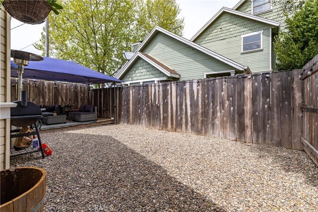 41 Thomas Ct, Templeton, CA 93465 - fenced backyard featuring an outdoor living space and a patio