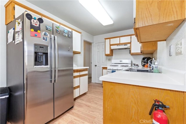 41 Thomas Ct, Templeton, CA 93465 - kitchen with stainless steel refrigerator with ice dispenser, white gas range oven, under cabinet range hood, light countertops, and light wood-type flooring