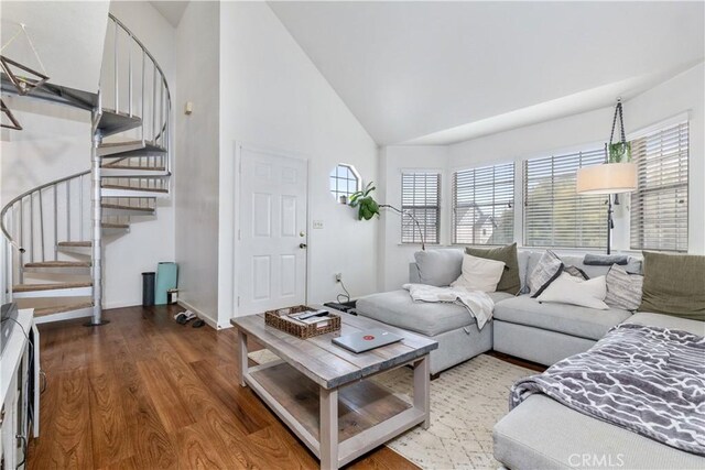 41 Thomas Ct, Templeton, CA 93465 - living area featuring high vaulted ceiling, stairs, wood finished floors, and baseboards