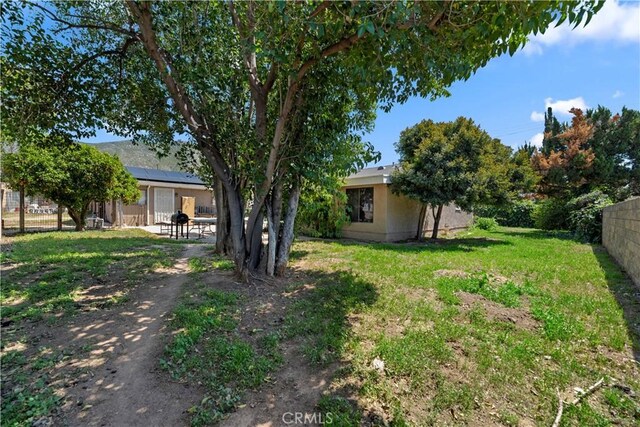 22432 Van Buren St, Grand Terrace, CA 92313 - view of yard featuring a patio area and a fenced backyard