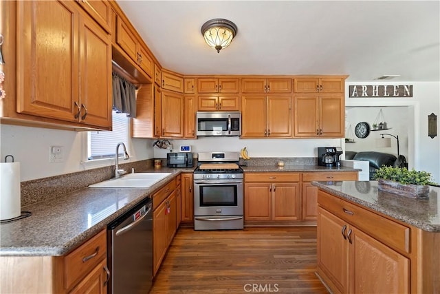 22432 Van Buren St, Grand Terrace, CA 92313 - kitchen with a sink, stainless steel appliances, and brown cabinets