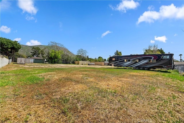 22432 Van Buren St, Grand Terrace, CA 92313 - view of yard featuring a mountain view and fence