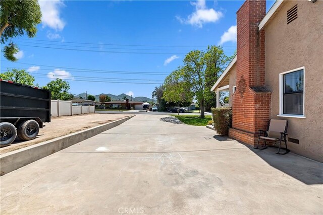 22432 Van Buren St, Grand Terrace, CA 92313 - view of street with a residential view and driveway
