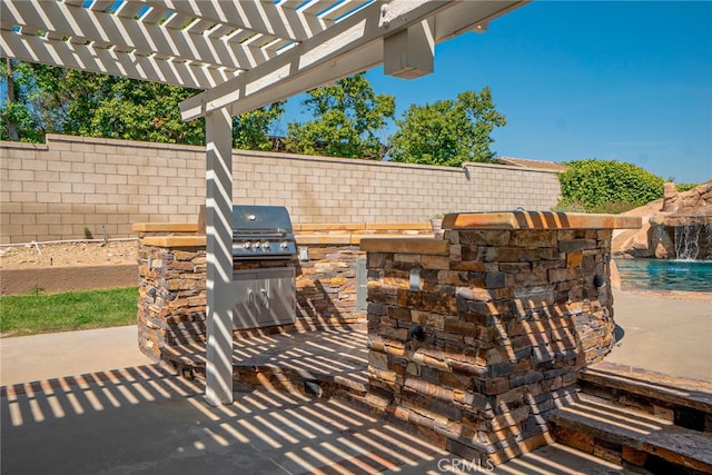 view of patio with a pergola, a fenced backyard, and area for grilling