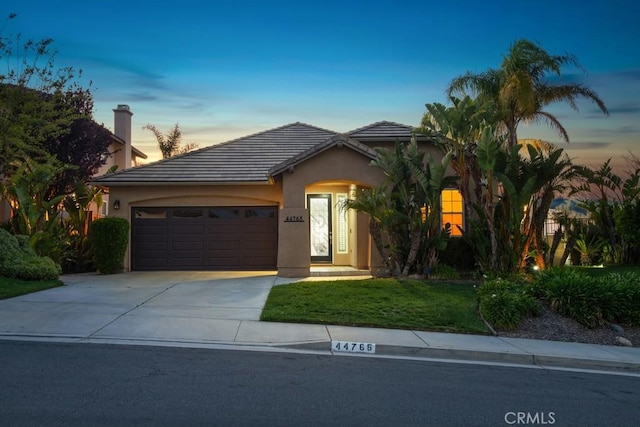 44765 Rutherford St, Temecula, CA 92592 - ranch-style house with a tile roof, driveway, an attached garage, a front yard, and stucco siding