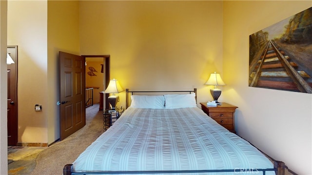 755 Cienega Rd Unit B, Big Bear Lake, CA 92315 - carpeted bedroom with a high ceiling and baseboards