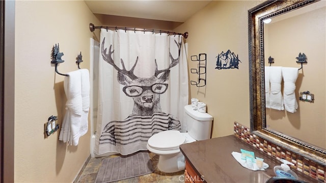755 Cienega Rd Unit B, Big Bear Lake, CA 92315 - bathroom with shower / tub combo, toilet, vanity, and stone finish flooring