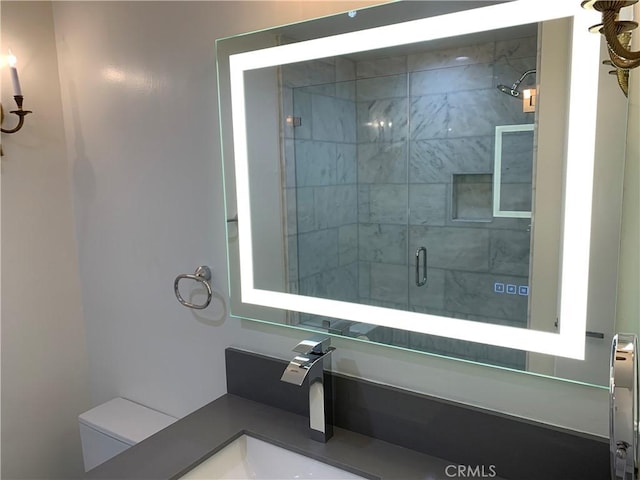 full bathroom with a shower stall and a sink