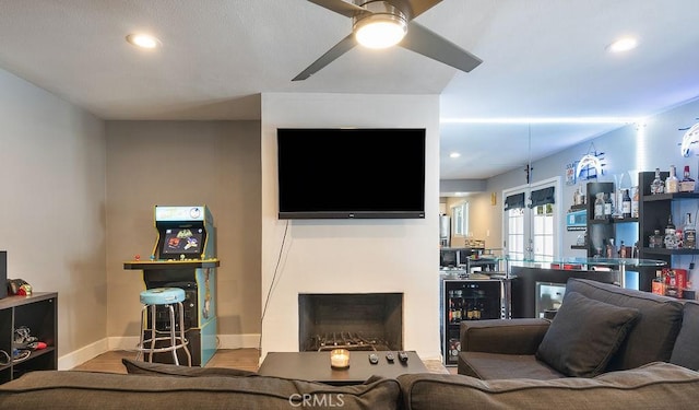 1192 Mitchell Ave Unit 66, Tustin, CA 92780 - living area featuring a dry bar, ceiling fan, beverage cooler, wood finished floors, and recessed lighting