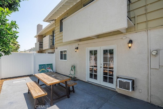 1192 Mitchell Ave Unit 66, Tustin, CA 92780 - view of patio with french doors and outdoor dining space