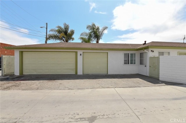 garage featuring fence