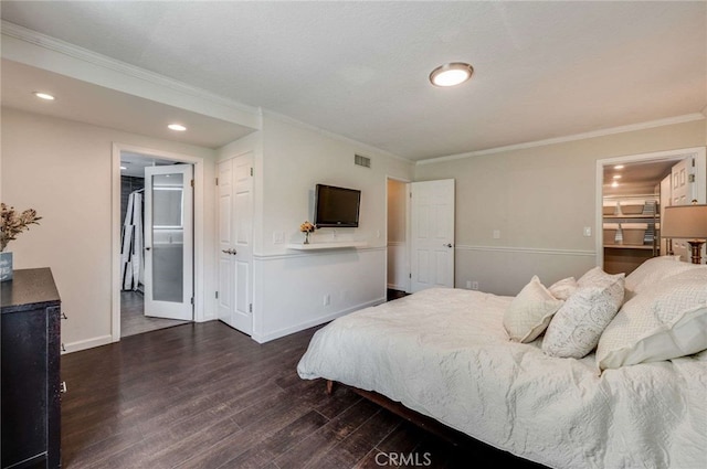 bedroom featuring visible vents, baseboards, ornamental molding, recessed lighting, and wood finished floors
