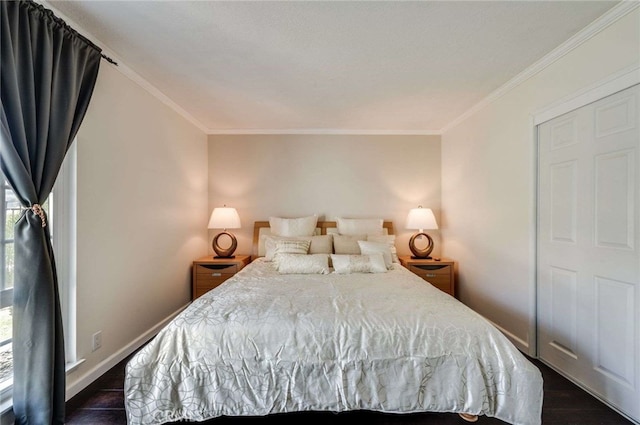 bedroom featuring baseboards and crown molding