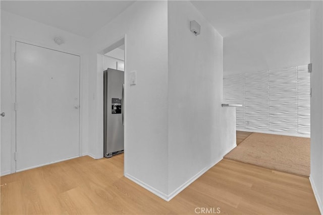 28121 Highridge Rd Unit 402, Rancho Palos Verdes, CA 90275 - hallway with light wood finished floors and baseboards