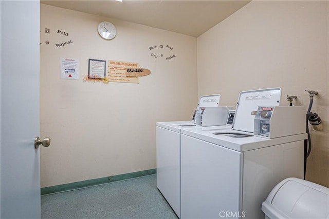 28121 Highridge Rd Unit 402, Rancho Palos Verdes, CA 90275 - shared laundry area featuring independent washer and dryer and baseboards