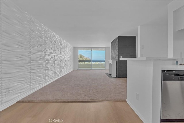 28121 Highridge Rd Unit 402, Rancho Palos Verdes, CA 90275 - hall featuring baseboards, wood finished floors, and carpet floors