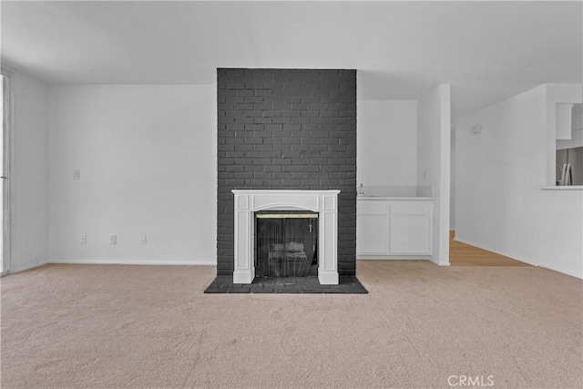 28121 Highridge Rd Unit 402, Rancho Palos Verdes, CA 90275 - unfurnished living room with carpet floors and a fireplace