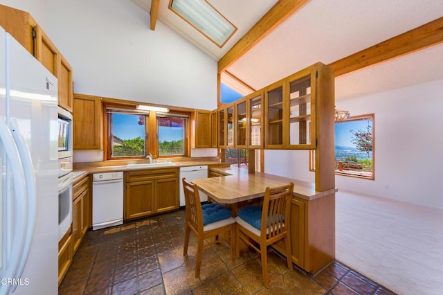 6860 Worth Way, Camarillo, CA 93012 - kitchen featuring a sink, light countertops, beamed ceiling, and white appliances