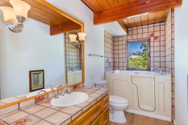 6860 Worth Way, Camarillo, CA 93012 - bathroom featuring vanity, wood finished floors, toilet, a bath, and wooden ceiling