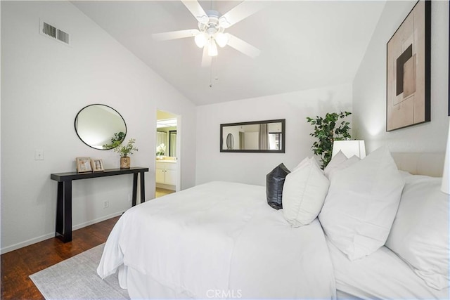 bedroom featuring lofted ceiling, baseboards, ceiling fan, visible vents, and wood finished floors