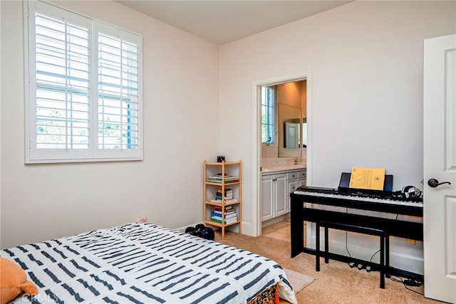 1550 Hibiscus Ave, Azusa, CA 91702 - bedroom featuring light carpet, multiple windows, and connected bathroom