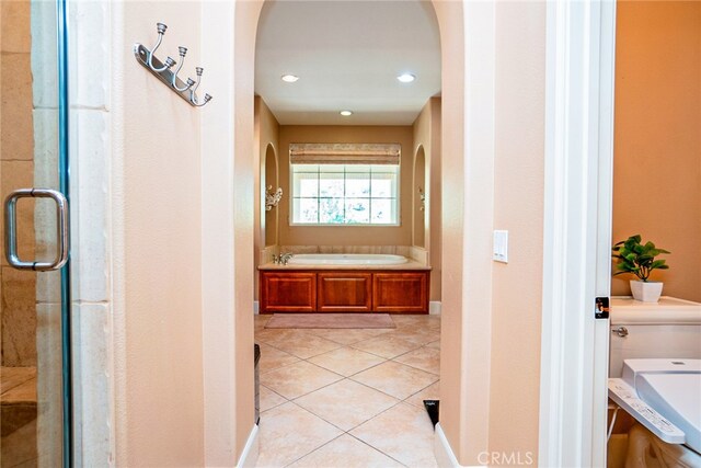 1550 Hibiscus Ave, Azusa, CA 91702 - full bath with a bath, baseboards, a shower stall, recessed lighting, and tile patterned flooring