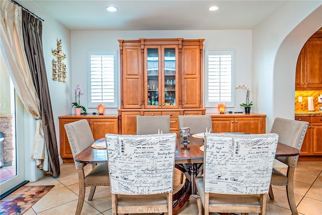 1550 Hibiscus Ave, Azusa, CA 91702 - dining space with arched walkways, light tile patterned floors, plenty of natural light, and recessed lighting