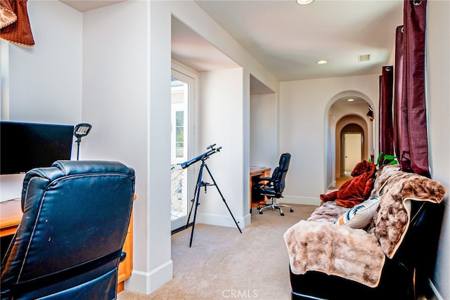 1550 Hibiscus Ave, Azusa, CA 91702 - home office featuring visible vents, baseboards, arched walkways, recessed lighting, and light colored carpet