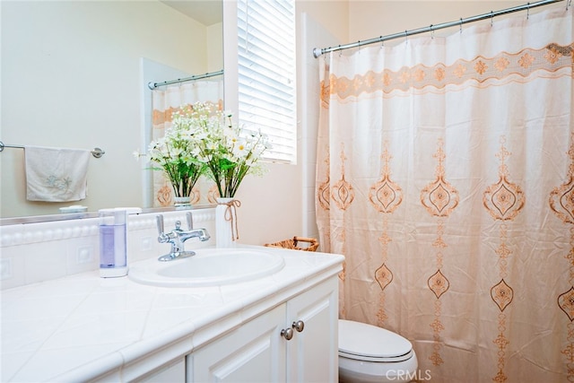 1550 Hibiscus Ave, Azusa, CA 91702 - bathroom with toilet, a shower with shower curtain, and vanity