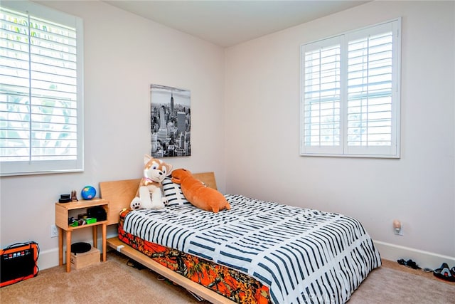 1550 Hibiscus Ave, Azusa, CA 91702 - carpeted bedroom with multiple windows and baseboards