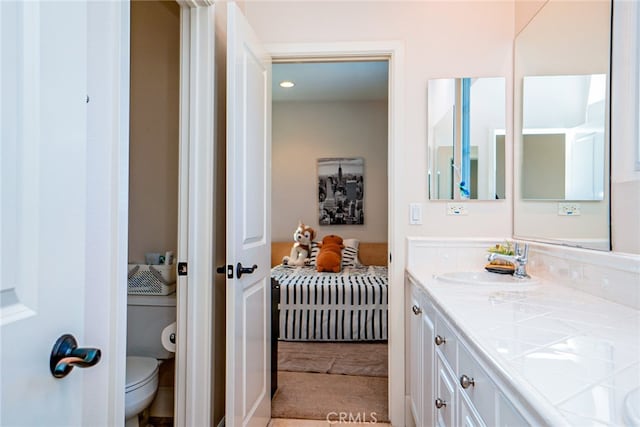 1550 Hibiscus Ave, Azusa, CA 91702 - full bath with a sink, toilet, and double vanity