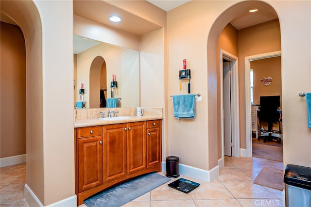 1550 Hibiscus Ave, Azusa, CA 91702 - bathroom with tile patterned floors, baseboards, and vanity