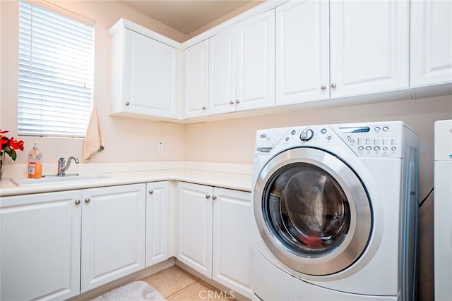 1550 Hibiscus Ave, Azusa, CA 91702 - laundry room with washer and dryer, light tile patterned floors, a sink, and cabinet space