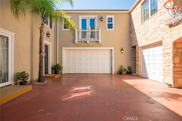1550 Hibiscus Ave, Azusa, CA 91702 - exterior space featuring stone siding, a garage, stucco siding, and concrete driveway