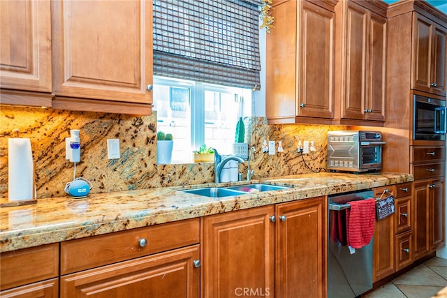 1550 Hibiscus Ave, Azusa, CA 91702 - kitchen with light stone counters, dishwasher, a sink, decorative backsplash, and built in microwave