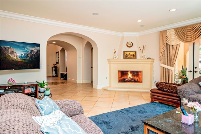 1550 Hibiscus Ave, Azusa, CA 91702 - living area featuring ornamental molding, arched walkways, tile patterned flooring, and a fireplace
