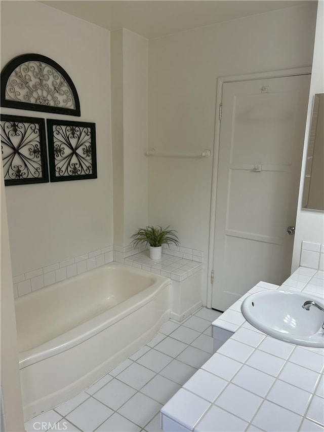 16624 Kelsloan St, Lake Balboa, CA 91406 - bathroom featuring tile patterned floors, a sink, and a bath