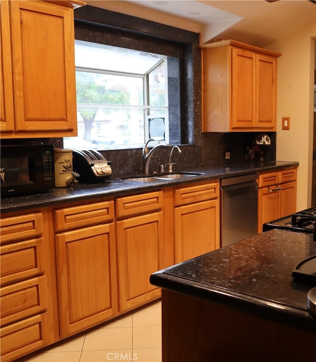 16624 Kelsloan St, Lake Balboa, CA 91406 - kitchen featuring black microwave, dishwasher, a sink, tasteful backsplash, and light tile patterned flooring