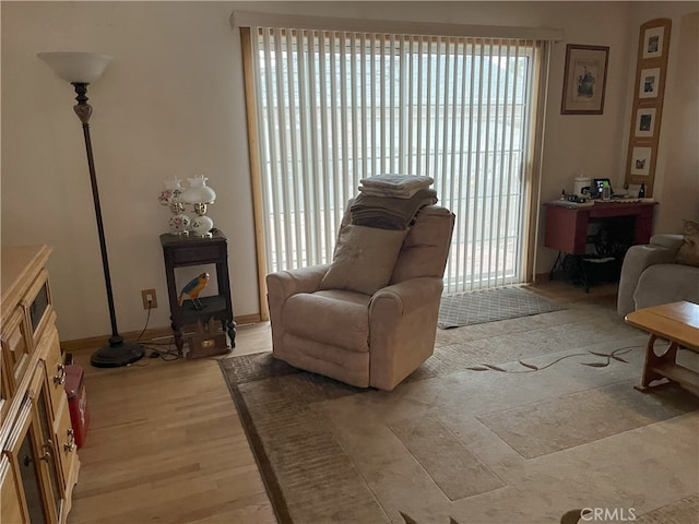 16624 Kelsloan St, Lake Balboa, CA 91406 - sitting room featuring plenty of natural light, light wood finished floors, and baseboards