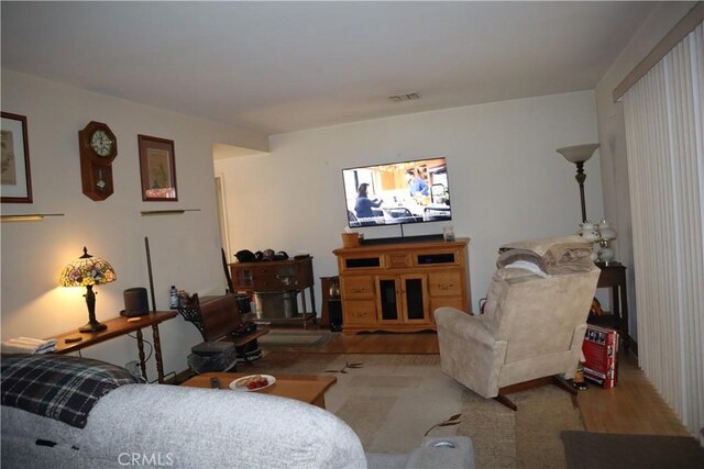 16624 Kelsloan St, Lake Balboa, CA 91406 - living room featuring wood finished floors