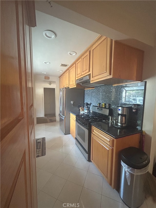 16624 Kelsloan St, Lake Balboa, CA 91406 - kitchen featuring appliances with stainless steel finishes, under cabinet range hood, tasteful backsplash, and recessed lighting