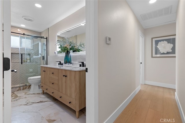full bathroom featuring vanity, visible vents, recessed lighting, toilet, and a stall shower